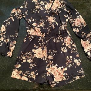 Floral slight bell long sleeved v-neck romper